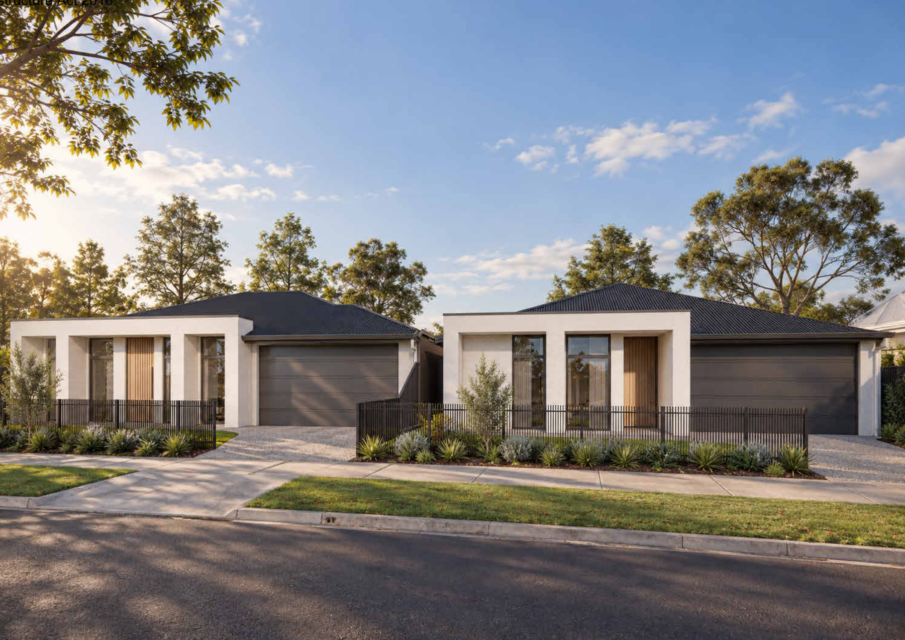 Two single-storey rendered homes side by side with double garages